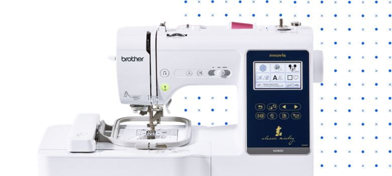 sewing machine on polka dot background